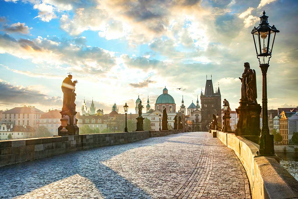 Charles Bridge in Prague, Czech Republic at sunrise with historic statues